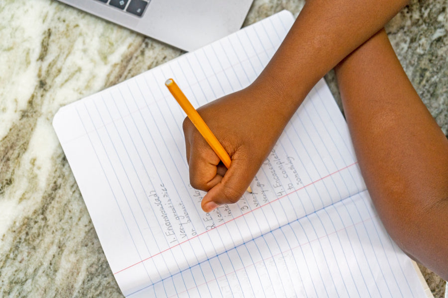 A student completing an RHZ Mastery Booklet